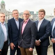 Five men standing on the quays in Cork.