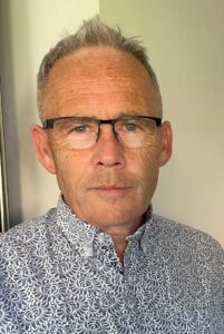 Man wearing glasses.