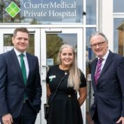 Two men and a woman outside a medical facility in Mullingar.