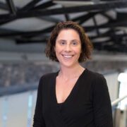 Woman wearing black dress.