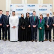 Large group of people at the signing of a contract in Dubai.
