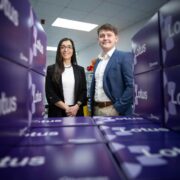 Man and woman surrounded by purple boxes.