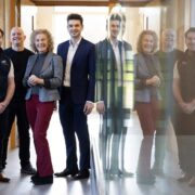 Group of men and women launching an AI investors day at UCD.