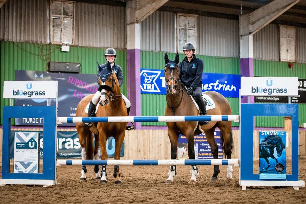 Man and woman on horses.