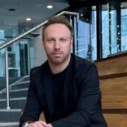 Man dressed in black.