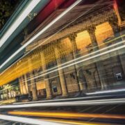 Bank of Ireland College Green in Dublin with digital signals passing on street.