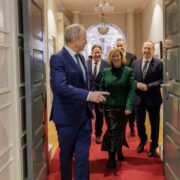 Irish Taoiseach escorting senior business men and women through Leinster House.