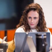 Woman working at a computer at an accelerator in Galway.