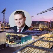 Man inset on image of construction of buildings in Dublin, Ireland.
