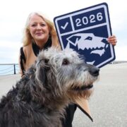 Woman with Dog, holding new Irish Digital Trust Mark.