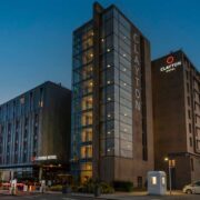 Dalata hotel in Dublin under an evening sky.