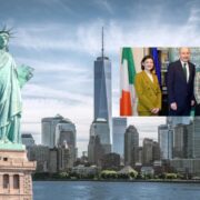 Three women and a man in blue suit.