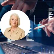 Overlay image of a professional headshot beside a laptop workspace with hands using digital devices, set against abstract financial charts and data visualisations representing AI and analytics in finance.