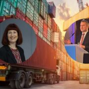 Photo composite showing stacked shipping containers and a freight truck in a busy port yard at sunset, overlaid with circular portraits of two business speakers, one delivering a speech at a podium and another studio headshot, illustrating global trade and economic analysis themes.