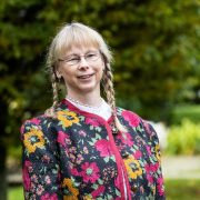 Andrea Pedersen of Andrea’s Kitchen, ACORNS programme graduate and founder of an award-winning East Cork artisan preserves business, pictured outdoors in a garden setting.