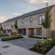 Modern energy-efficient family homes in a new Irish residential housing development, highlighting increased housing supply and homebuilding growth in Ireland in 2026.