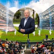 Padraic O'Kane pictured alongside a packed Aviva Stadium during the Aer Lingus College Football Classic in Dublin. The annual American college football event attracts thousands of US visitors and delivers major economic benefits for Irish tourism and business.