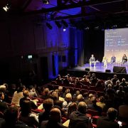 Audience attending a panel discussion at the West X West technology and innovation festival in Castlebar, featuring speakers discussing AI, startups, investment and enterprise growth in Ireland.