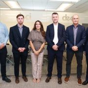 DECI leadership team and employees at the company's new Chicago office following the announcement of 250 new jobs, marking the Irish engineering firm's expansion in the US data centre and digital infrastructure market.