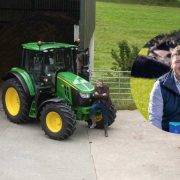 Mark Glennon of Bank of Ireland on an Irish farm with a tractor, discussing farm succession, agricultural technology, AI adoption and challenges facing Irish farmers.
