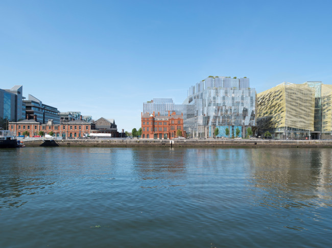 Proposed new building alongside traditional buildings in Dublin's docklands.