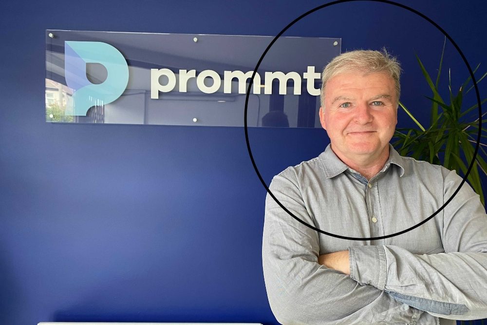 Man with arms folded.