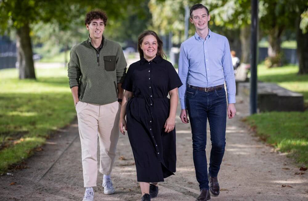 Two men and a woman.