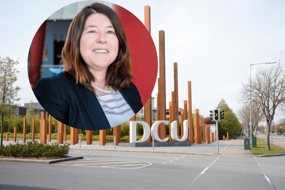 Woman in navy jacket.