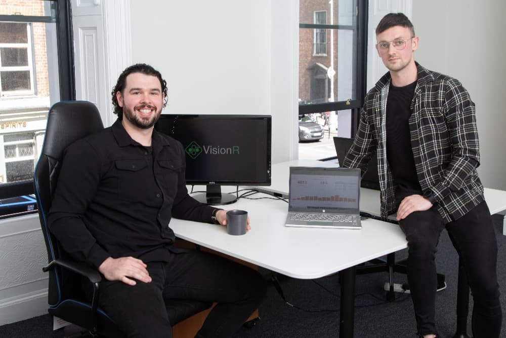 Two men in an office.