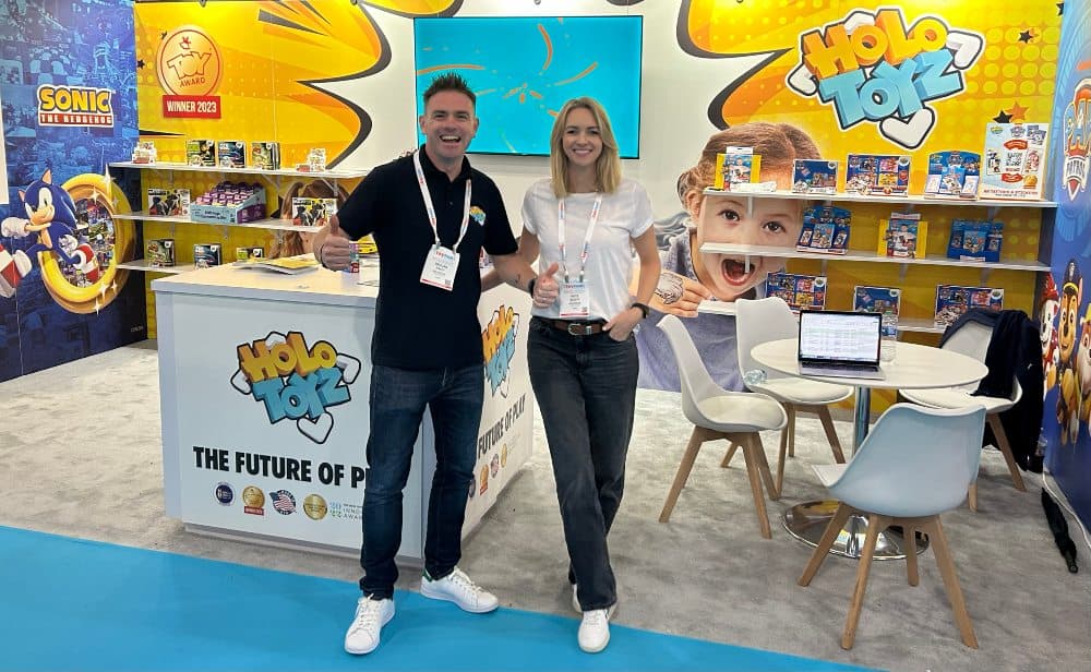 Man and woman at a toy exhibition in New York.