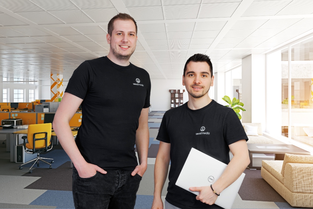 Two men in black t-shirts.