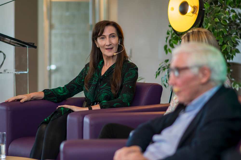 Woman speaking at a conference.