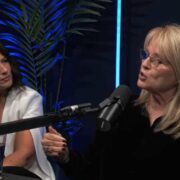 Two women speaking on a podcast.